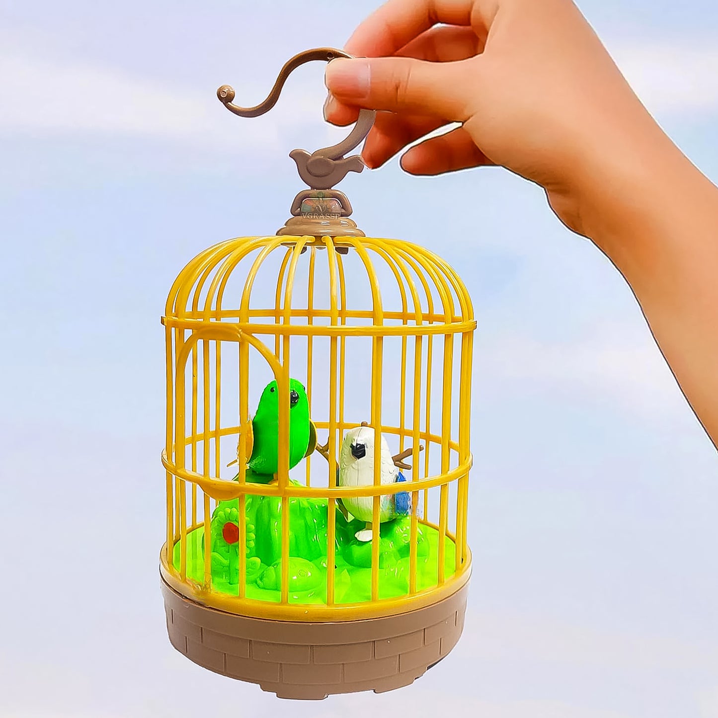 Sound-Activated Chirping Bird in Hanging Cage – Realistic Movement & LED Light (1 Pc)